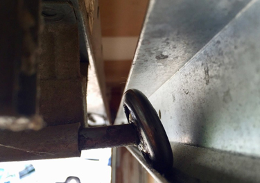 garage door roller repair in Belmont Heights
